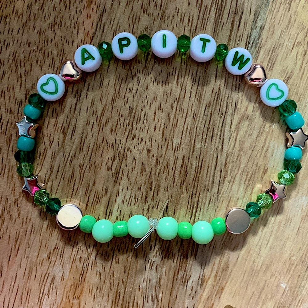 5 for $10 Taylor Swift Handmade Friendship Bracelet
“A Place In This World”